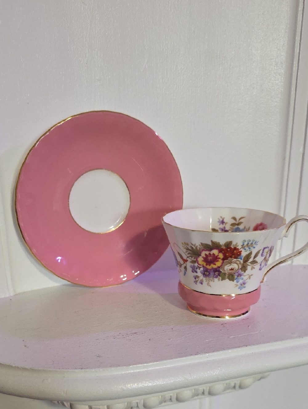 vintage Aynsley tea cup and saucer set, likely featuring a delicate pink hue